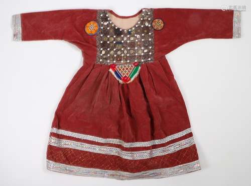 Zulu dress, the red ground decorated with three beadwork pan...