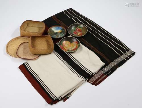 Madagascan objects, to include Lamba cloths, one in cream wi...