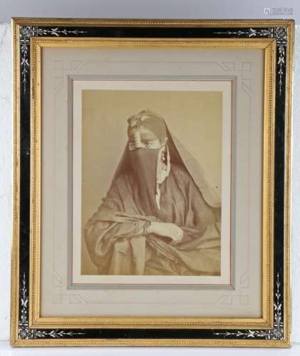 19th Century albumen print of an Arabic woman, wearing a Hij...