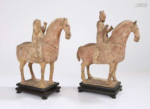 Near pair of Chinese pottery horse and riders, Tang Dynasty,...