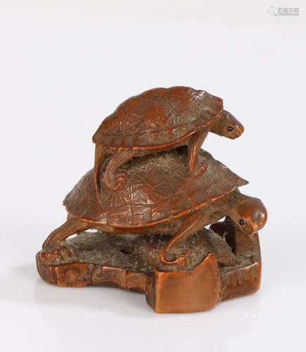 Japanese Edo period wood Netsuke, carved as three turtles st...