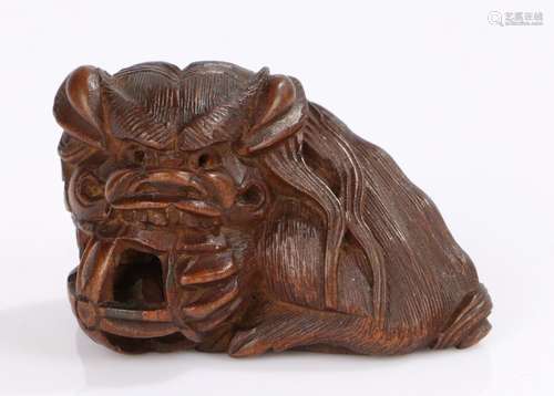 Japanese wood netsuke of Shishi, Asakusa school, signed Masa...