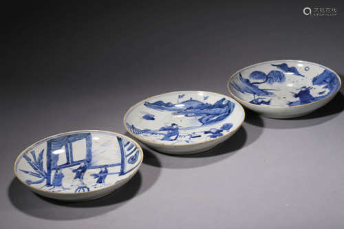 A Set Of Blue And White Figural Plates