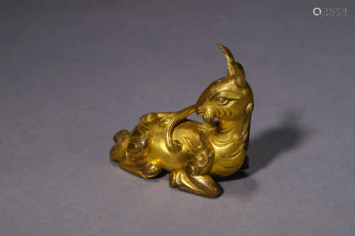 A Gilt Bronze Auspicious Beast Ornament