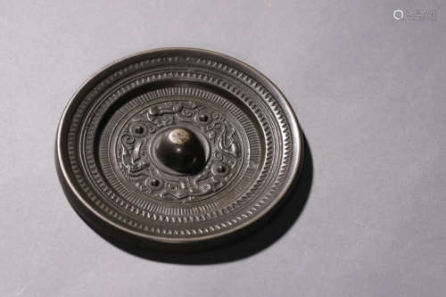 A Bronze Four-Nail Grain Circular Mirror