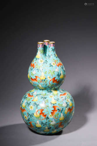 A Famille Rose Three-Spouts Double Gourd-Shaped Vase