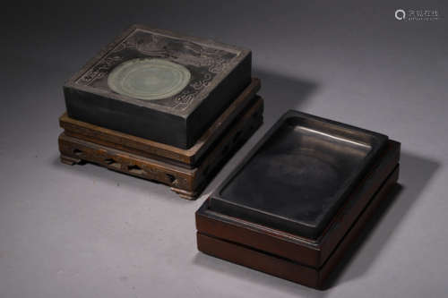 A Set Of Two Rectangular Inkslabs With Stands