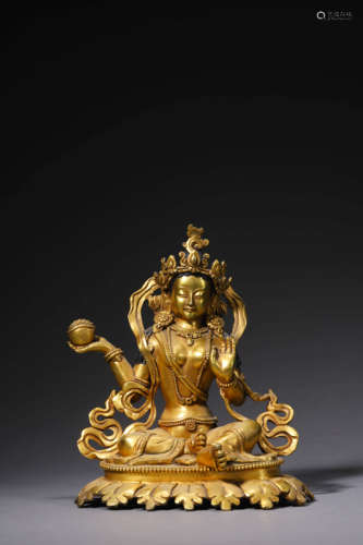 A Gilt Bronze Statue Of Medicine Buddha