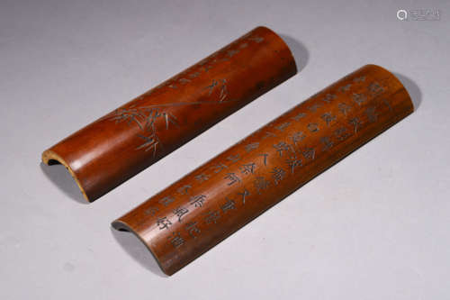 A Set Of Two Inscribed Bamboo Arm Rests