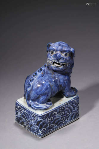 A Blue And White Lion Paper Weight