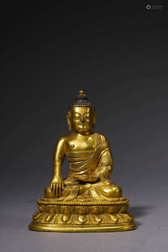 A Gilt Bronze Statue Of Shakyamuni