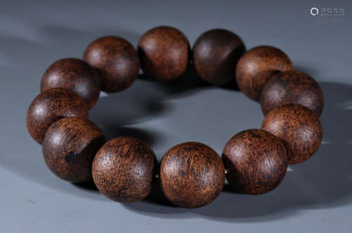 CHENXIANG WOOD STRING BRACELET WITH 12 BEADS