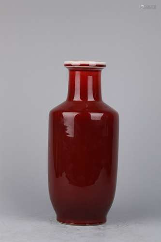 A RED GLAZED BOTTLE