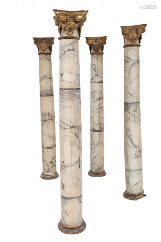 Four wooden columns. 18th-19th century