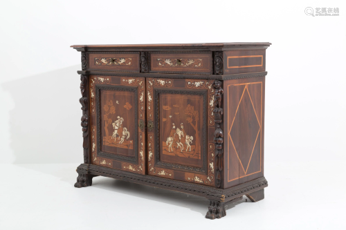 Wooden cupboard with sculptures. 19th century