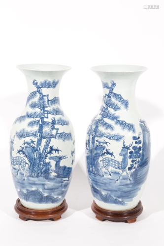 Two white and blue porcelain vases. Early 20th c