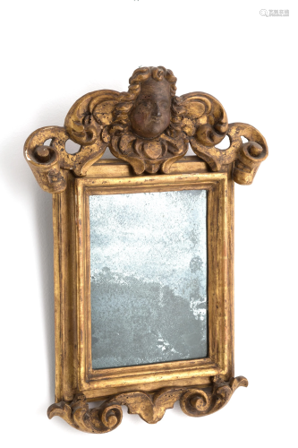 Small mirror in golden-plated wood. 17th century
