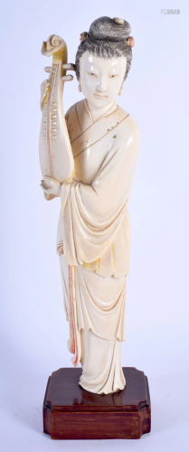 A LATE 19TH CENTURY CHINESE CARVED IVORY FIGURE OF…