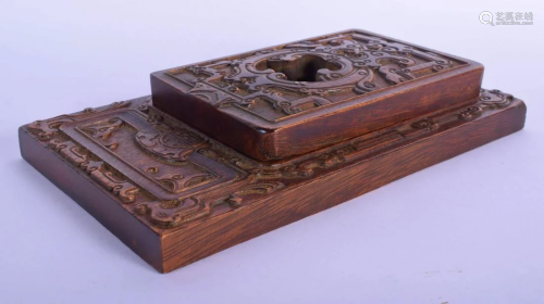 A RARE EARLY 20TH CENTURY CHINESE CARVED HARDWOOD INK