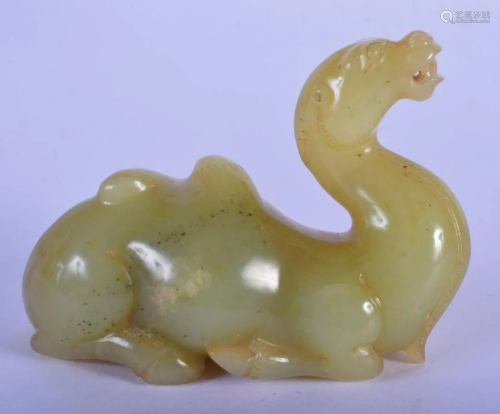 A RARE CHINESE QING DYNASTY CARVED JADE FIGURE OF A