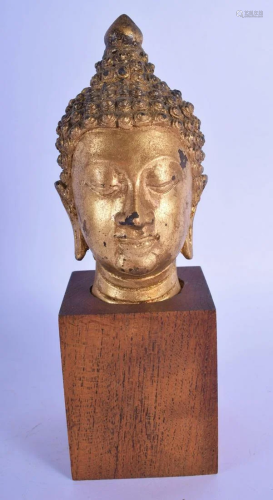 AN EARLY 20TH CENTURY SOUTH EAST ASIAN GILDED METAL