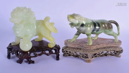 TWO EARLY 20TH CENTURY CHINESE CARVED JADE FIGURES OF