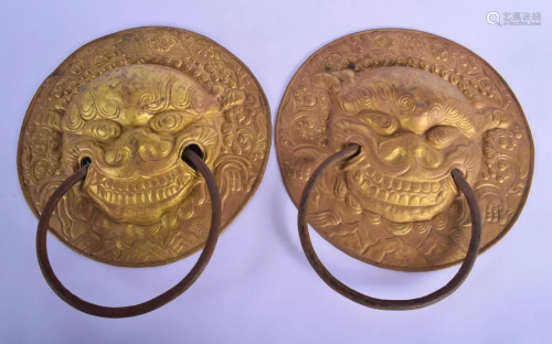 A RARE PAIR OF EARLY 20TH CENTURY CHINESE TIBETAN BRASS