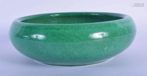 A CHINESE QING DYNASTY MONOCHROME GREEN GLAZED BR…