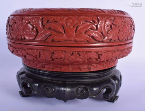 AN EARLY 20TH CENTURY CHINESE CARVED RED CINNABAR