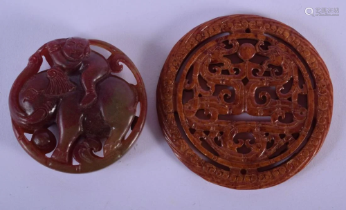 A CHINESE CARVED BLOOD JADE ELEPHANT ROUNDEL 20th