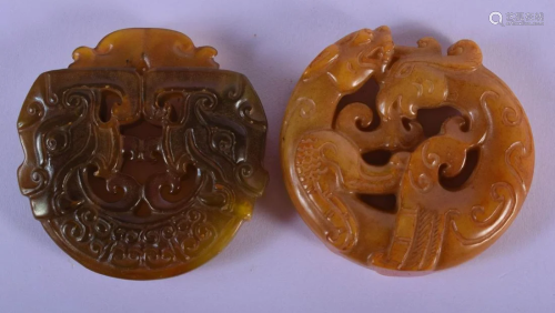 TWO CHINESE CARVED YELLOW JADE MYTHICAL PENDANT…