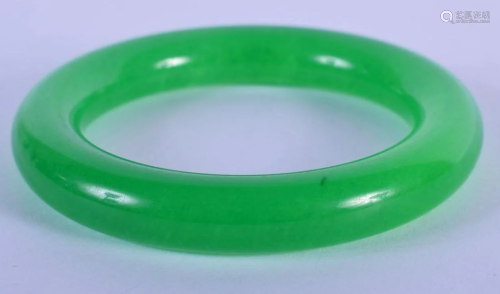 A CHINESE JADE BANGLE. 5.5 cm wide.