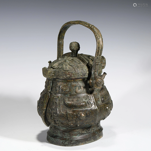 SHANG PATINATED BRONZE RITUAL EWER