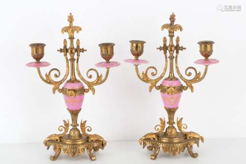Two bronze and porcelain candlesticks. 19th c