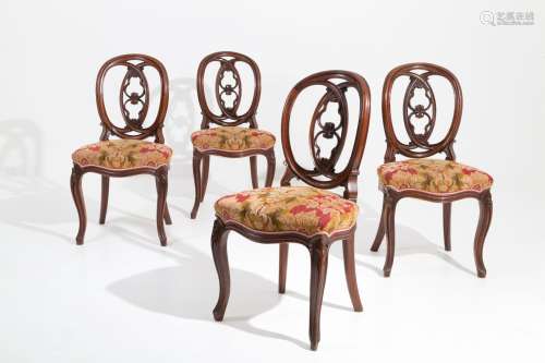 Four chairs in wood and fabric. 19th century