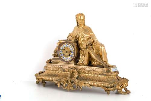 Clock in golden-plated bronze. 19th century