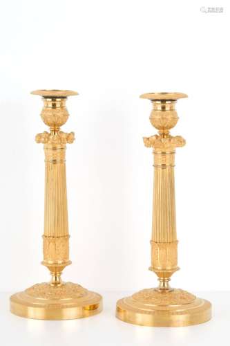 Two golden-plated bronze candlesticks. 19th c