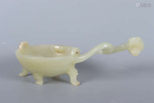 A CARVED JADE DRAGON-HANDLE WASHER