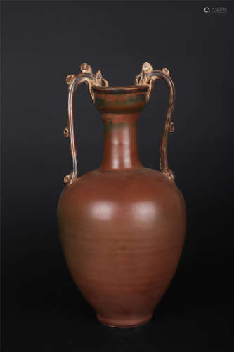 A DING WARE TWIN-DRAGON DISH-TOP VASE