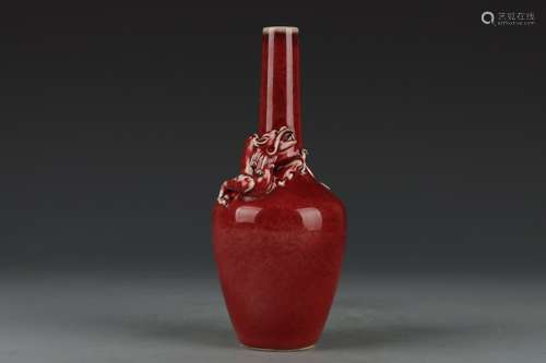 A SACRIFICIAL RED GLAZE APPLIQUE DECORATED BOTTLE VASE