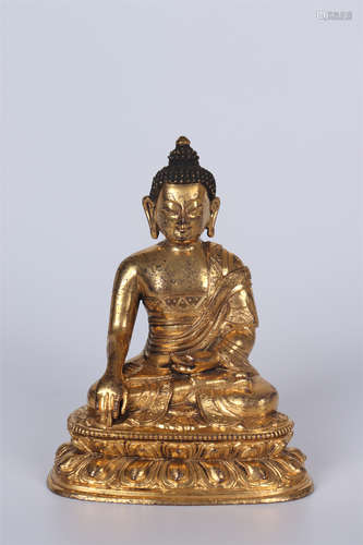 A GILT BRONZE SEATED BUDDHA STATUE