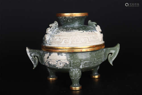 A GILDING JADE TRIPOD INCENSE BURNER AND COVER