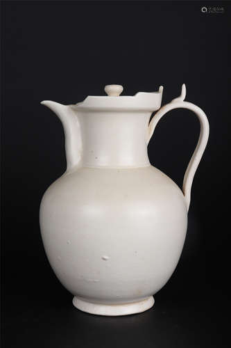 A DING WARE WHITE GLAZE MONK’S CAP JUG