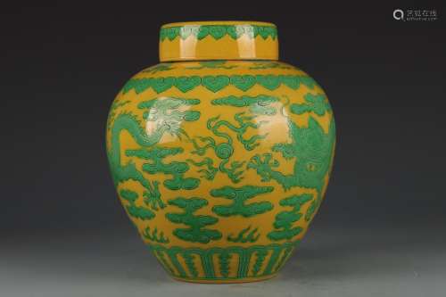 A YELLOW-GROUND AND GREEN-ENAMEL DRAGON AND PEARL OVOID JAR ...