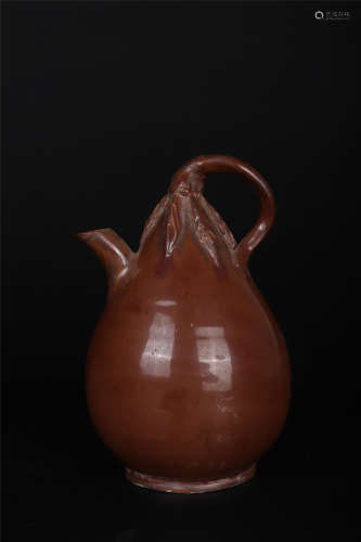 A DING WARE EGGPLANT-SHAPED EWER