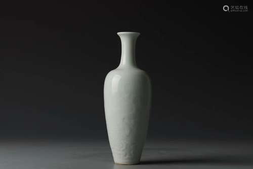 A CELADON-GLAZE DRAGON AND WAVE NECKED VASE