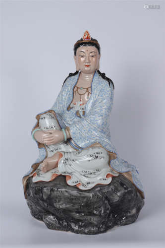 A FAMILLE ROSE POTTERY GUANYIN STATUE