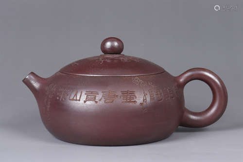 A CHINESE PURPLE CLAY SCRIPT TEAPOT