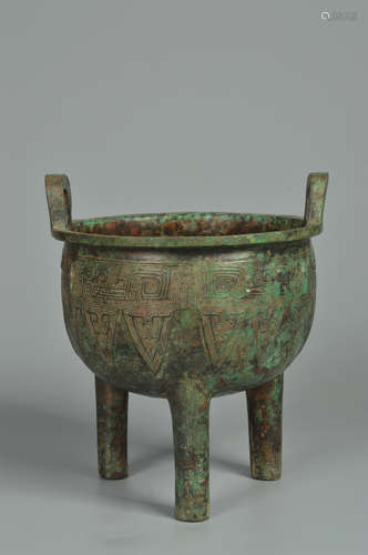 AN ARCHAIC BRONZE TRIPOD VESSEL, DING