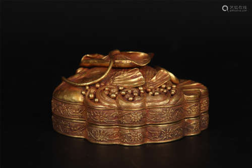 A GILT BRONZE LOTUS-SHAPED BOX AND COVER